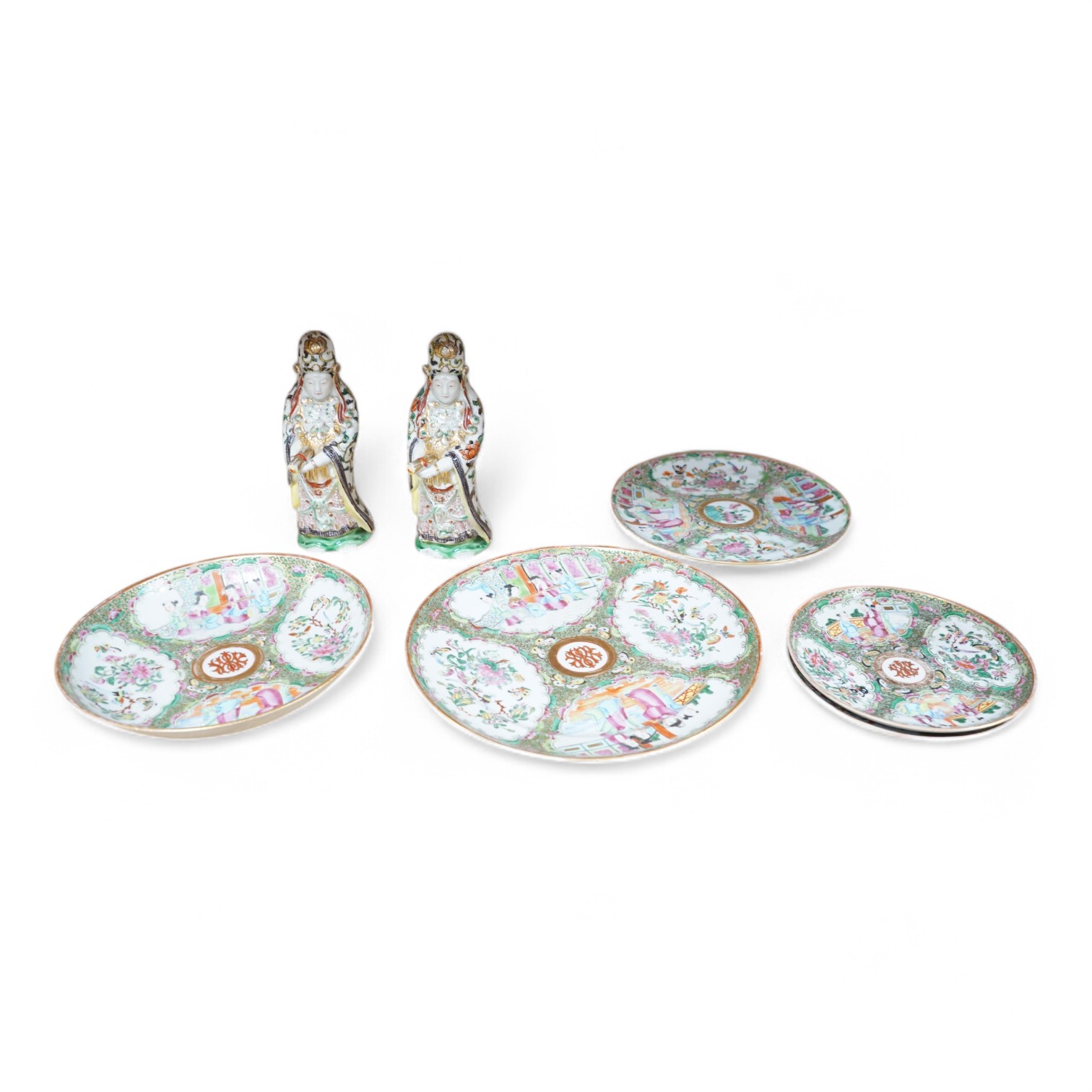 Five Chinese famille rose plates, Guangxu period and a pair of Chinese figures, 25cm in diameter. Condition - fair to good
